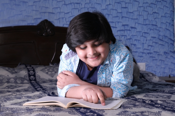 Child reading at home