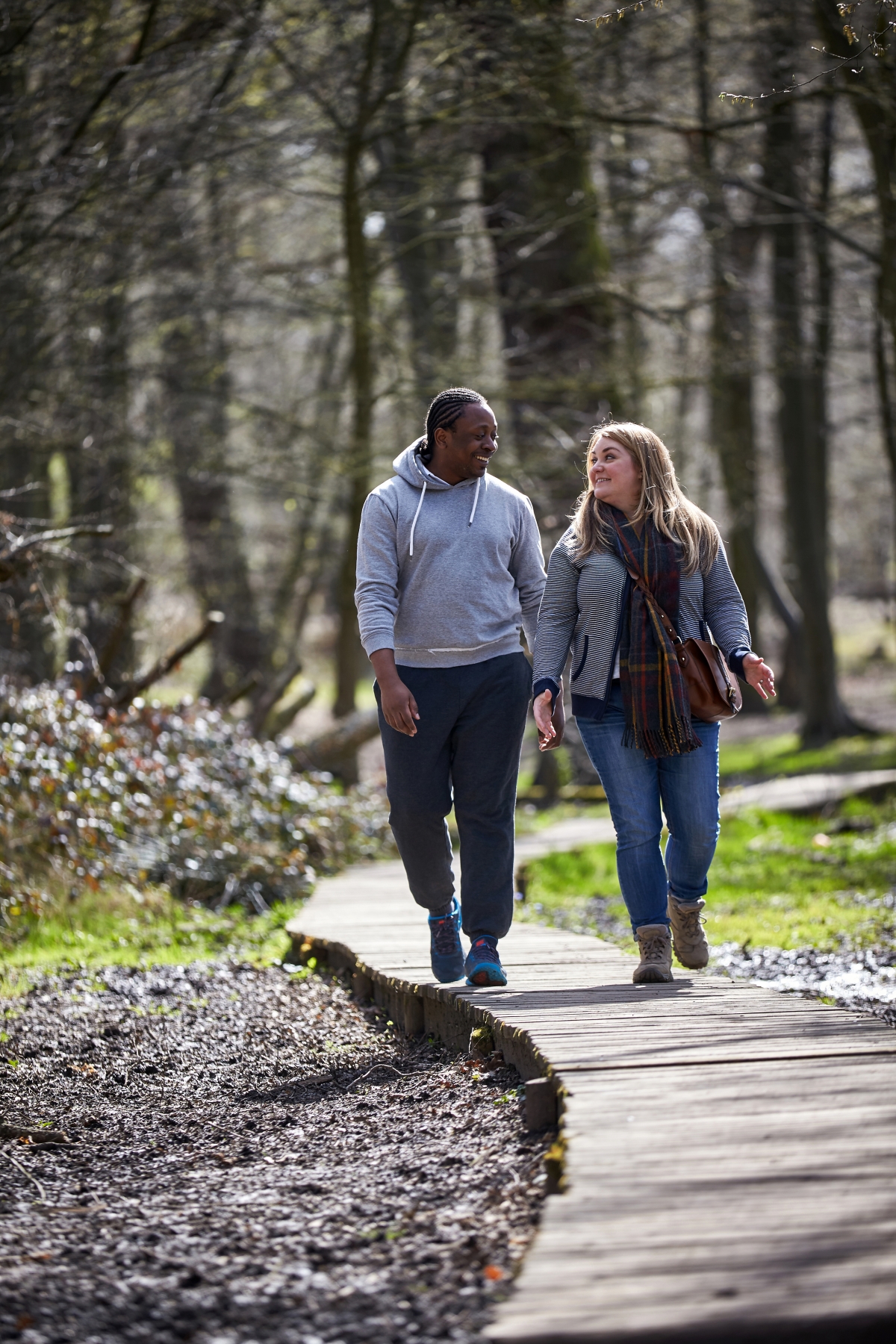 Couple taking a walk in the woods 