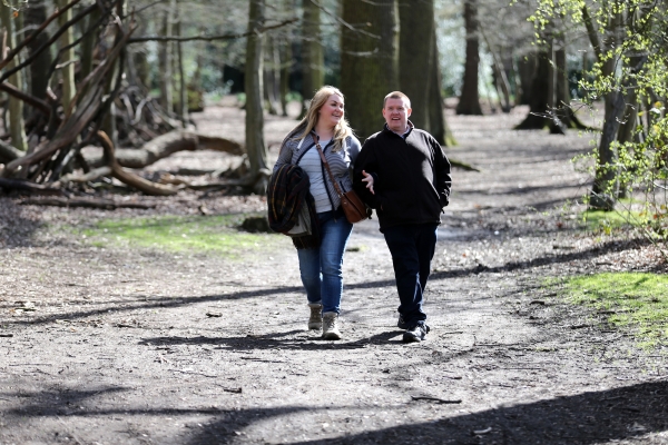 Couple walking in the woods 