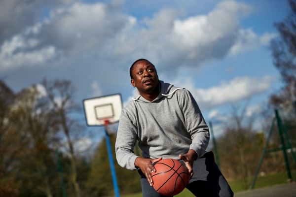 Man playing basketball 