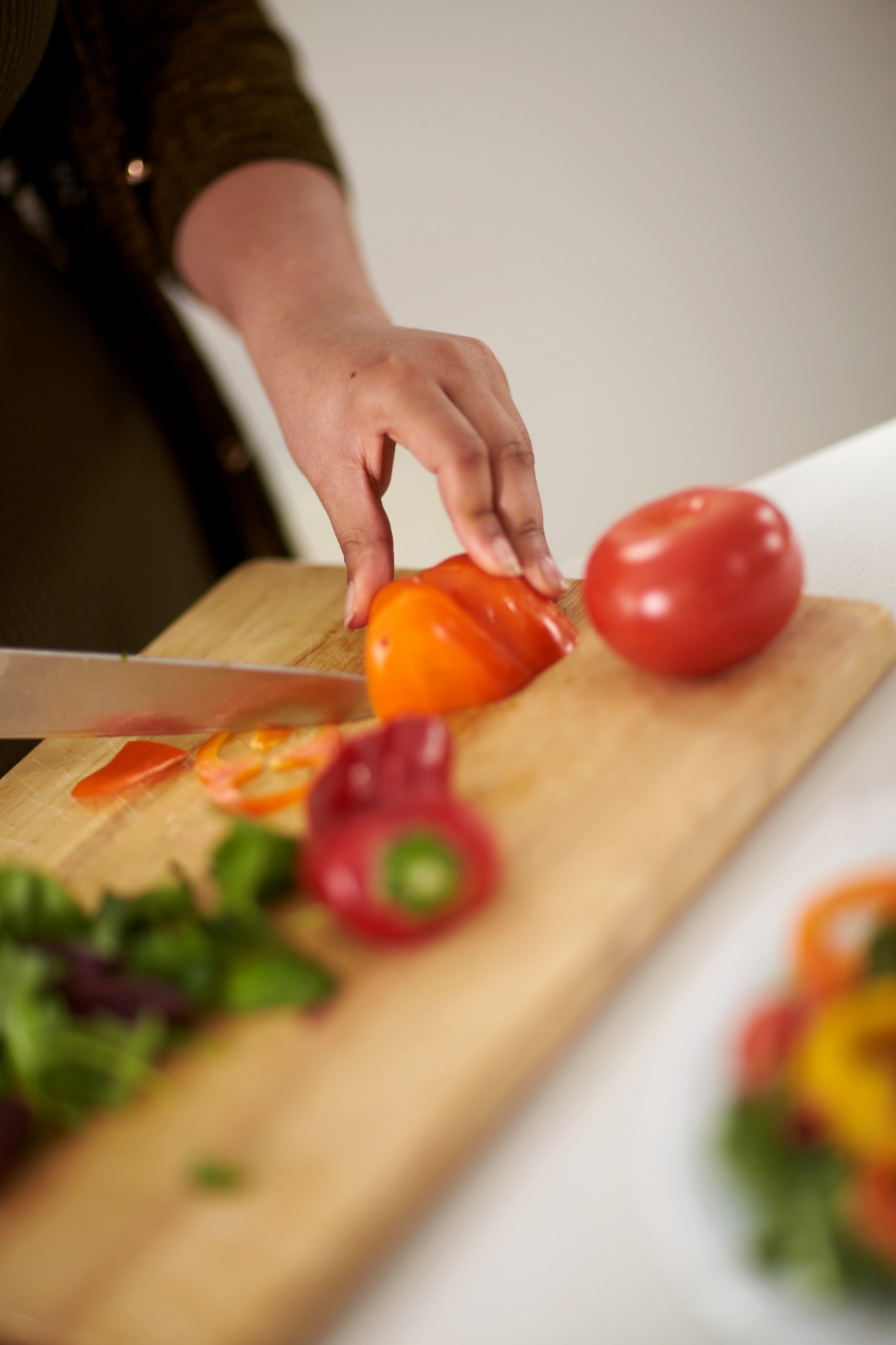 Chopped vegetables on chopping board 