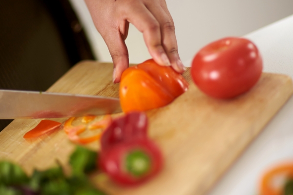 Chopped vegetables on chopping board 