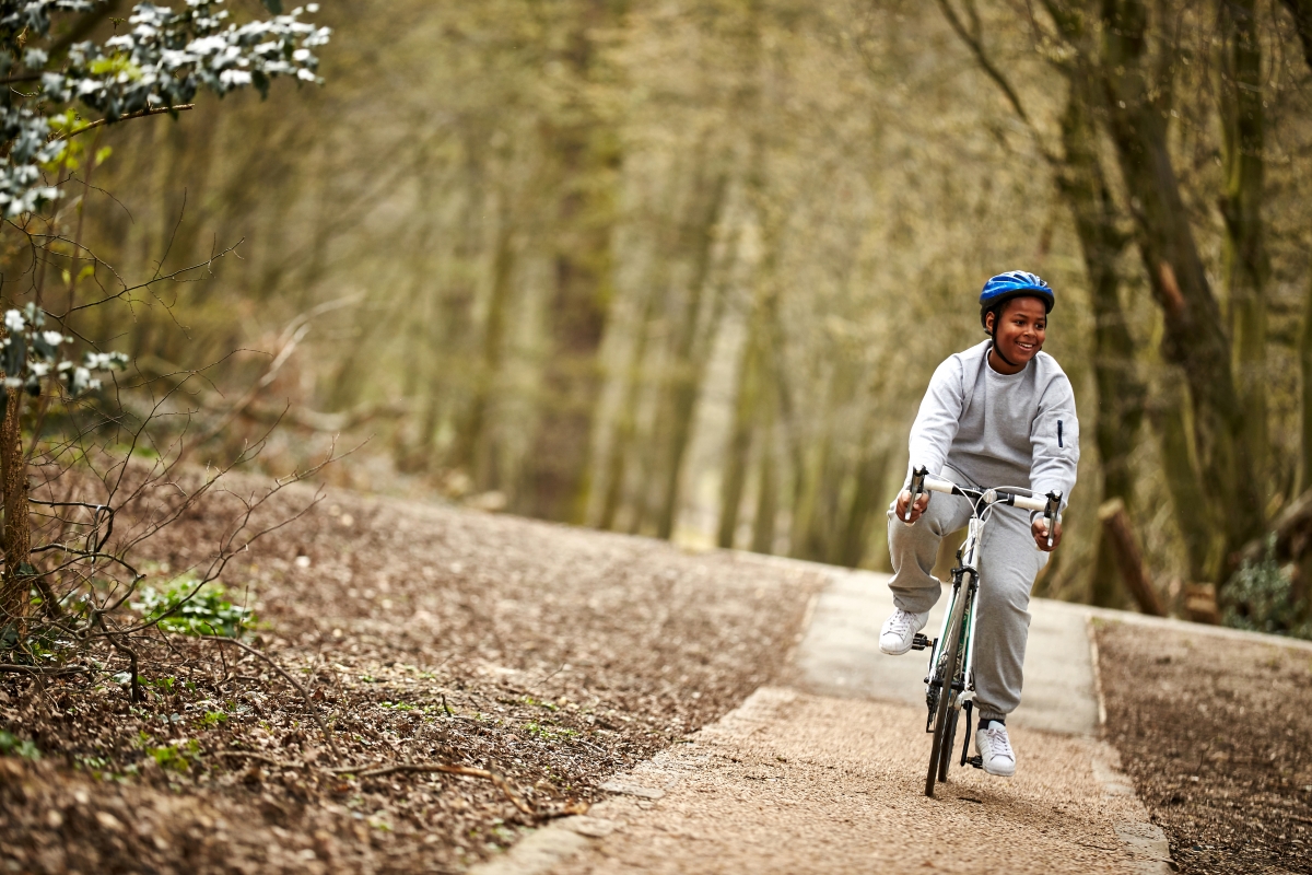Boy cycling on sale