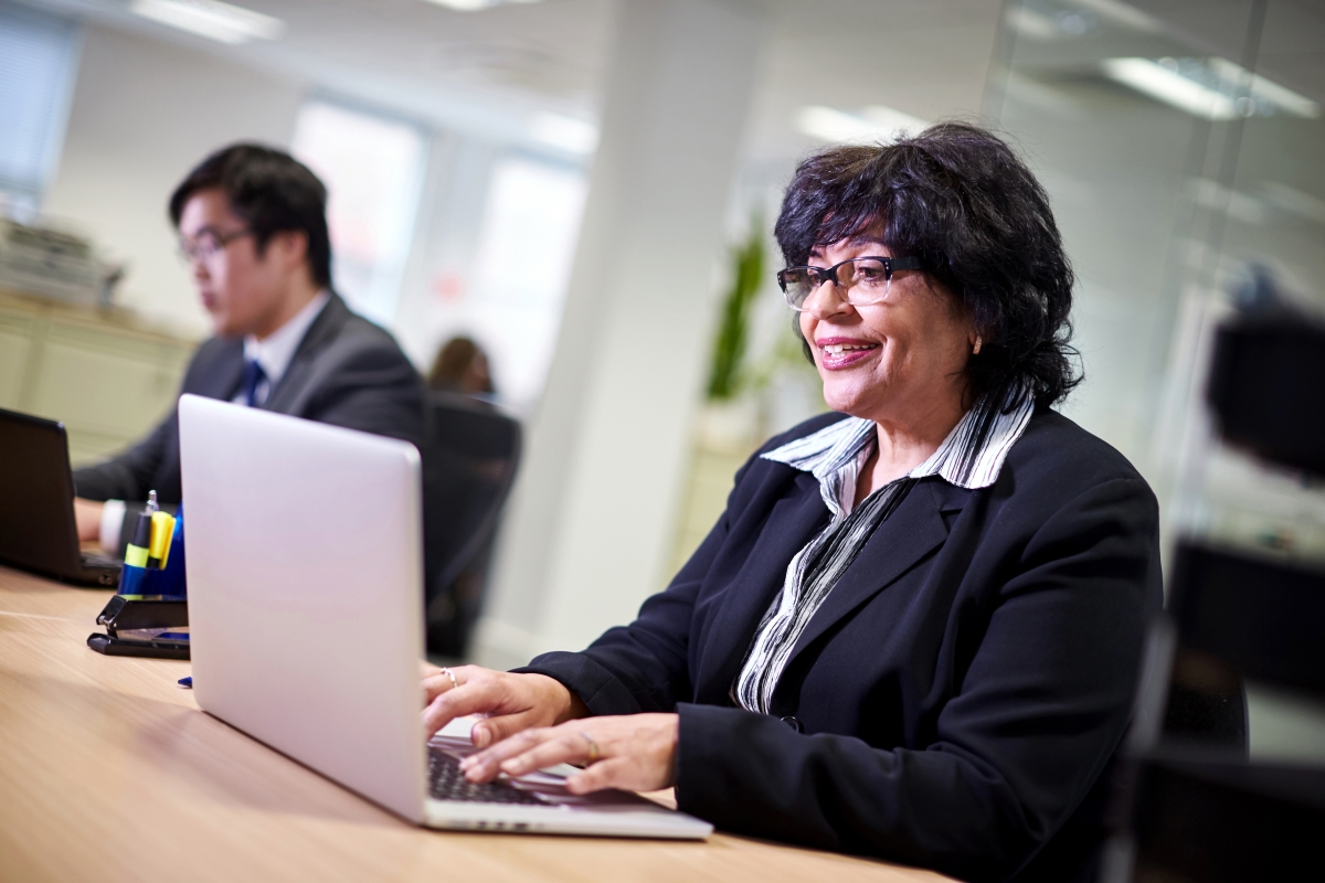 Woman working on laptop in the office 