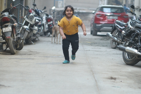 Child running in the street