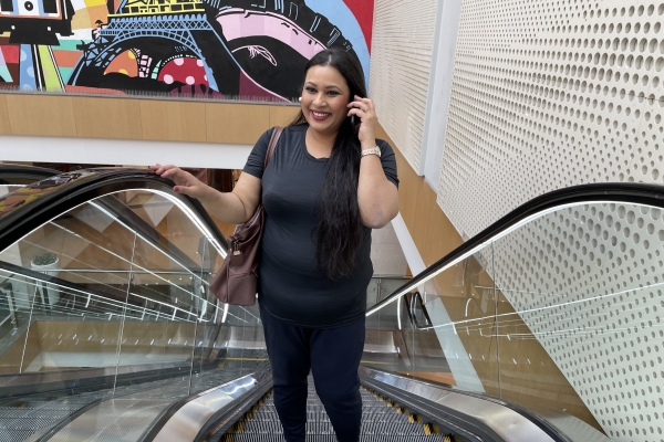 Woman on an escalator