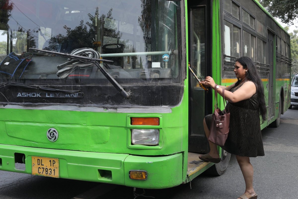 Woman taking the bus