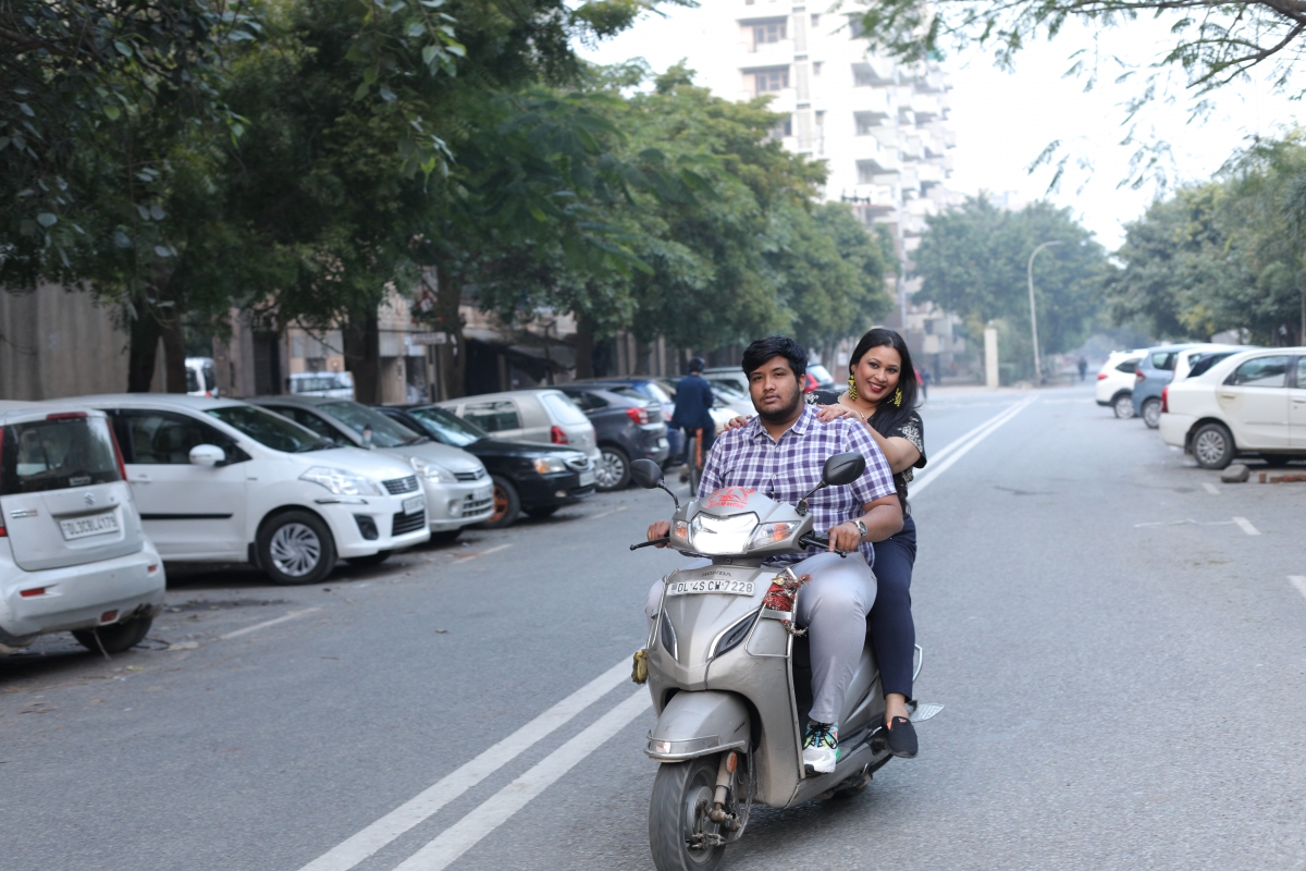 Man and woman on a scooter