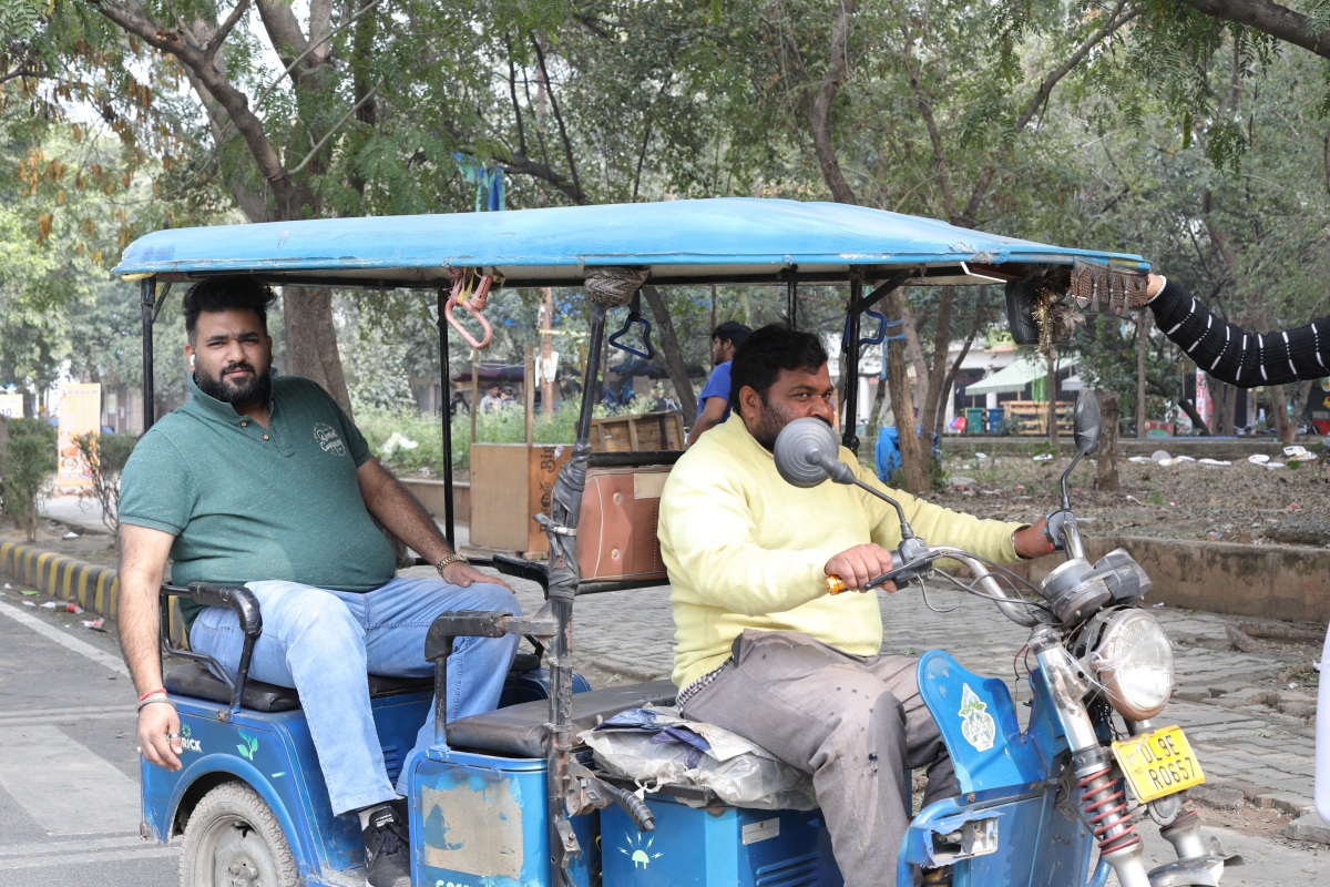 Man in an auto rickshaw