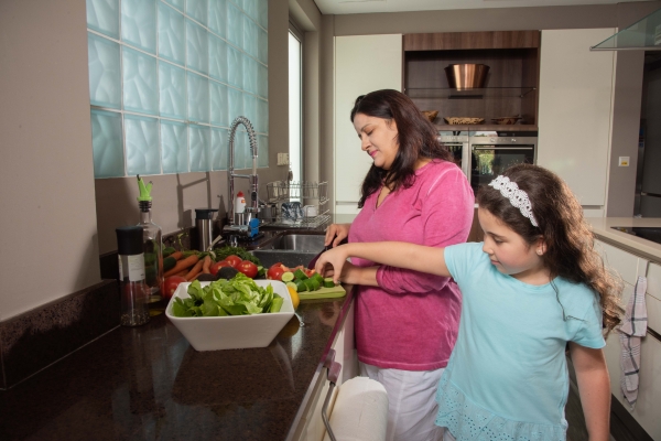 Woman and child preparing dinner 2