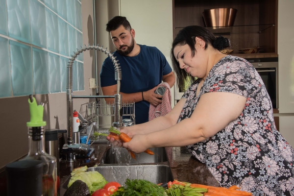 Woman and man preparing dinner 2