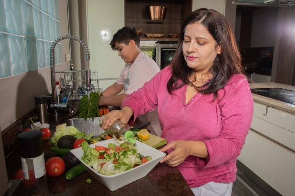 Woman and boy preparing dinner 3