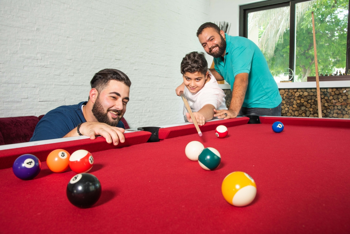 Playing billiards World Obesity Federation